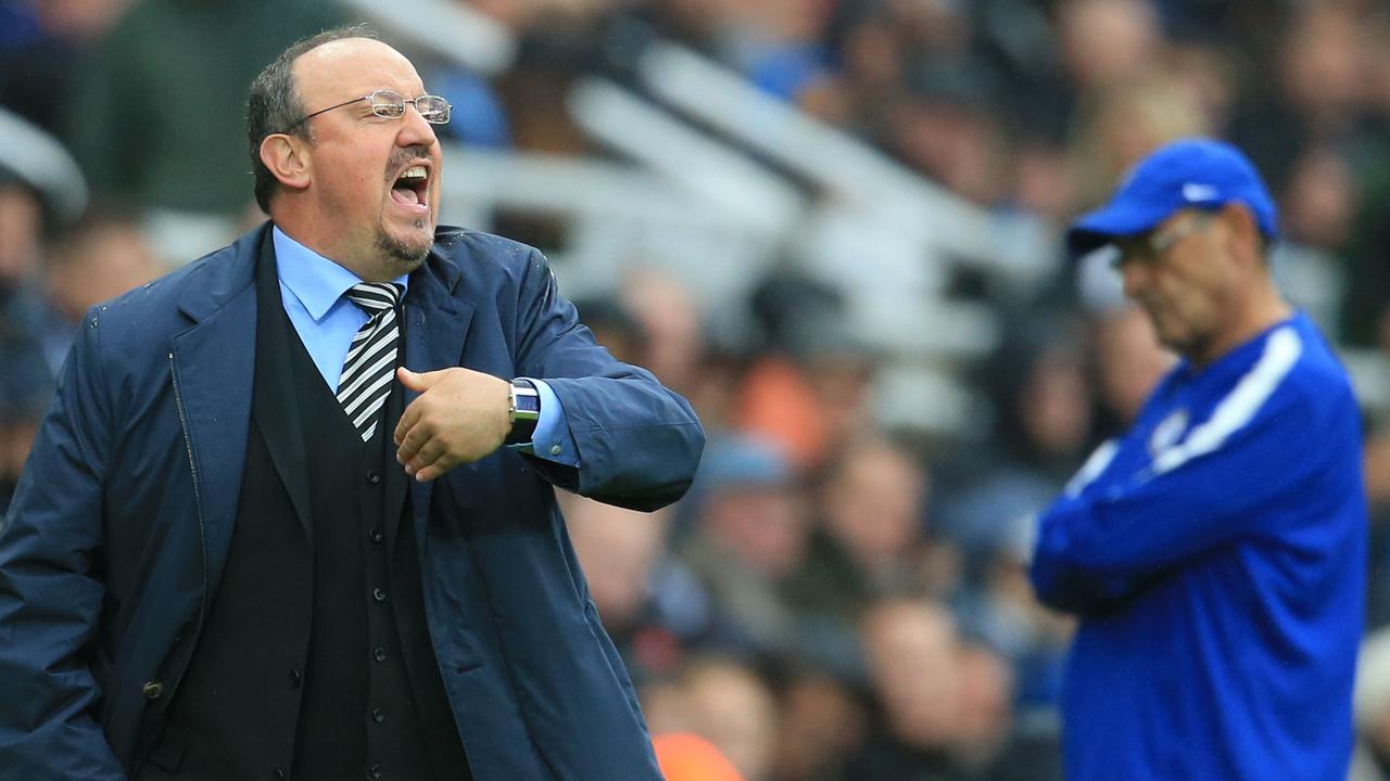 Newcastle United's Spanish manager Rafael Benitez gestures from the touchline, with Chelsea’s Maurizio Sarri in the background.