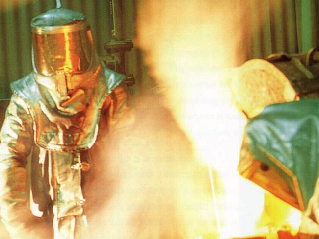 Gold mining - Gold being poured at Newcrest Telfer operation in WA. /Mineral/resources