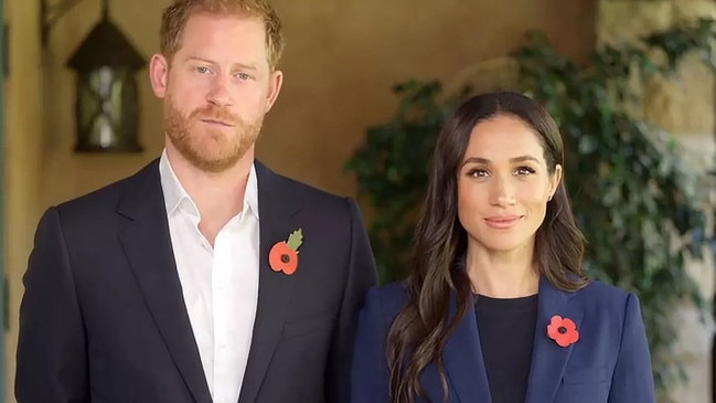 Prince Harry and Meghan Markle appear together.