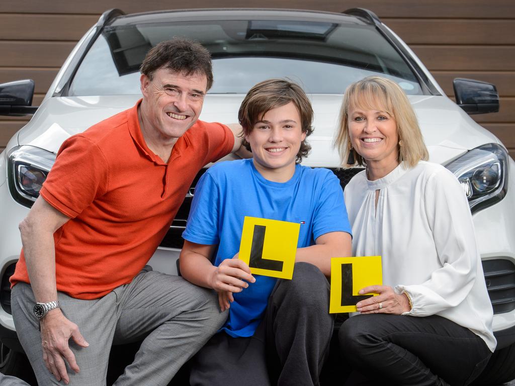 Zac Fuleky with his parents Rob and Jo. Zak is learning how to drive using the new online simulator MyDriveschool. Picture: Jay Town