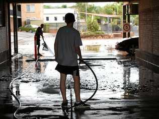 FLOOD CLEANUP: Locals were in town to cleanup and get things back to normal in the CBD. Picture: Marc Stapelberg