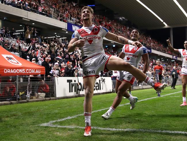 WOLLONGONG, AUSTRALIA – JUNE 07: Zac Lomax of the Dragons celebrates after scoring a try during the round 14 NRL match between St George Illawarra Dragons and Wests Tigers at WIN Stadium on June 07, 2024, in Wollongong, Australia. (Photo by Jason McCawley/Getty Images)