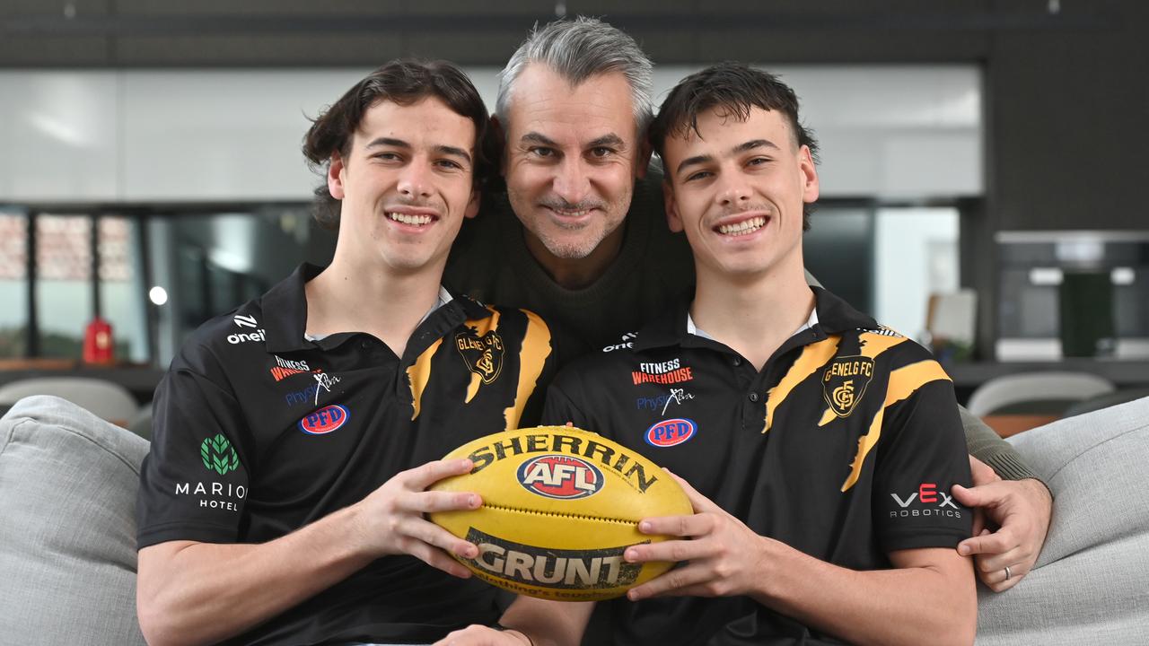 Former Carlton AFL footballer Scott Camporeale with his twin boys and rising footy stars, Glenelg's Ben and Lucas. Picture: Keryn Stevens