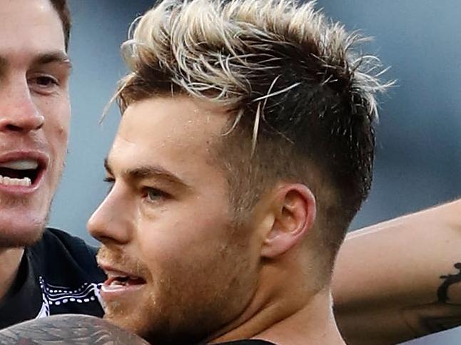 MELBOURNE, AUSTRALIA - MAY 28: Jamie Elliott of the Magpies (right) celebrates a goal with Jack Crisp of the Magpies during the 2017 AFL round 10 match between the Collingwood Magpies and the Brisbane Lions at the Melbourne Cricket Ground on May 28, 2017 in Melbourne, Australia. (Photo by Adam Trafford/AFL Media/Getty Images)