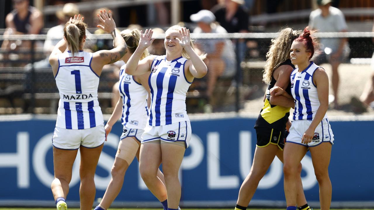 North Melbourne’s Daria Bannister celebrates her goal in the third quarter that ended Richmond’s resistance. Picture: Getty Images