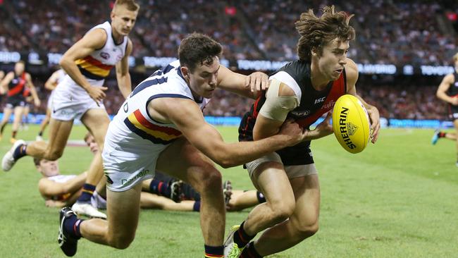 Andrew McGrath beats Mitch McGovern to the footy. Picture: Michael Klein