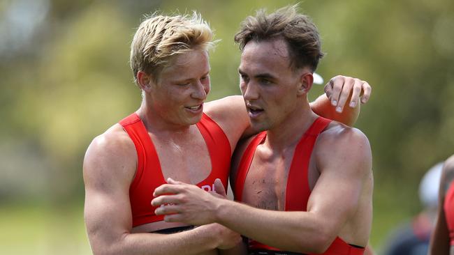 Isaac Heeney with new recruit Ryan Clarke, right, during the pre-season.