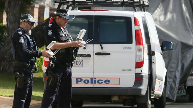 Police about to launch a drone from the crime scene of the murder of popular doctor Luping Zeng at MacGregor. AAP Image/Richard Waugh