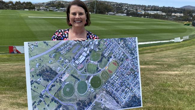 Kingborough Mayor Paula Wriedt, pictured last year, with an aerial view of an expanded Twin Ovals precinct to accommodate an AFL high performance centre. The council was ultimately unsuccessful in its bid to secure the development for the municipality. Picture: James Bresnehan