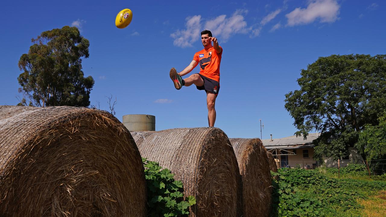 GWS’ Lachlan Ash on his family's farm in Katandra, Victoria. (AAP Image/Scott Barbour)
