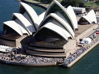 Crowds of people and boats line the Sydney Harbour foreshores in anticipation of the New Year's Eve fireworks tonight. Crowds...