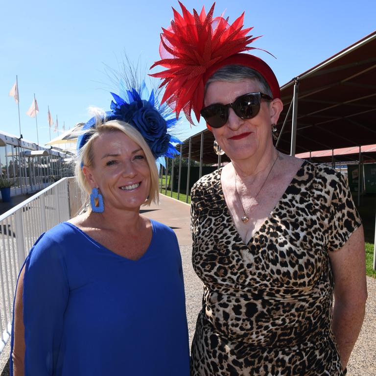 Donna Edmonstone and Marita Wilson at the Darwin Turf Club Bridge Toyota Ladies' Day / Derby Day. Picture: KATRINA BRIDGEFORD