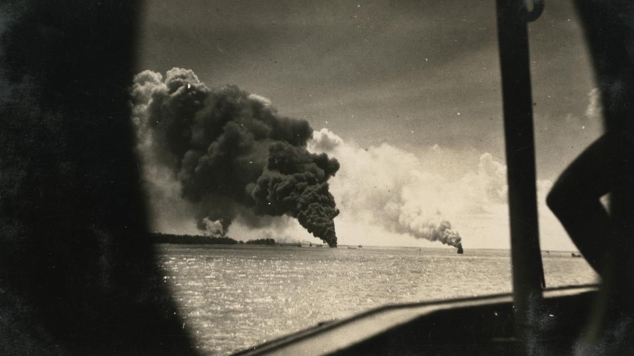 Bombing of Darwin: Ships burning in Darwin Harbour, after the Bombing of Darwin,1942.