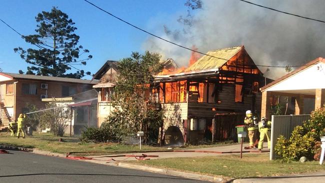 The moment a Southport house explodes in flames. Photo: Tracy Barker