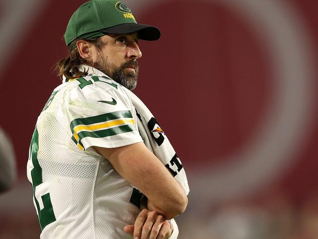 GLENDALE, ARIZONA - OCTOBER 28: Aaron Rodgers #12 of the Green Bay Packers watches action from the sideline during the second half of a game against the Arizona Cardinals at State Farm Stadium on October 28, 2021 in Glendale, Arizona. (Photo by Christian Petersen/Getty Images)