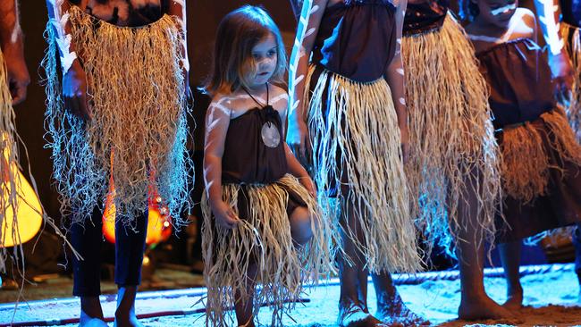 Emily Fourmile, 3, of the Gimuy Walaburra Yindiji dancers performs with other children at the opening night of the Cairns Indigenous Art Fair, held at the Cairns Convention Centre. Picture: Brendan Radke