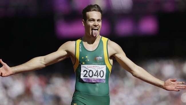 Evan O'Hanlon celebrates his gold in the 200m in London.