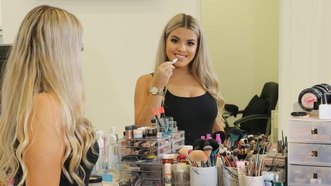 Makeup by Jaz is one of the Coast's biggest YouTubers and Instagram stars. Jasmine Hand 23 putting on makeup at work at Bulletproof Makeup Studio at Varsity Lakes. Picture: Glenn Hampson