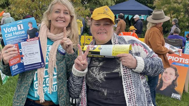 Candidate supporters Leanne Woods and Raelene Holland outside the Macksville Seniors Citizens polling booth. Picture: Chris Knight