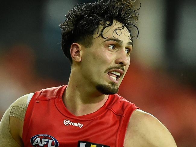 GOLD COAST, AUSTRALIA - MARCH 27: Izak Rankine of the Suns marks during the round 2 AFL match between the Gold Coast Suns and the North Melbourne Kangaroos at Metricon Stadium on March 27, 2021 in Gold Coast, Australia. (Photo by Matt Roberts/AFL Photos/via Getty Images)