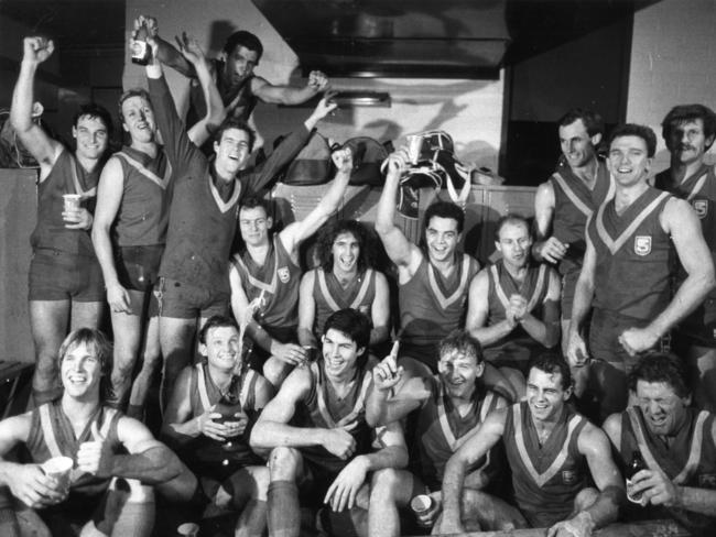 Kick a Vic ... The South Australians celebrate their four-point win over Victoria. Some big names here, including Andrew Jarman, John Platten, Bruce Lindner, Craig Bradley, Stephen Kernahan, Tony McGuinness and Chris McDermott.