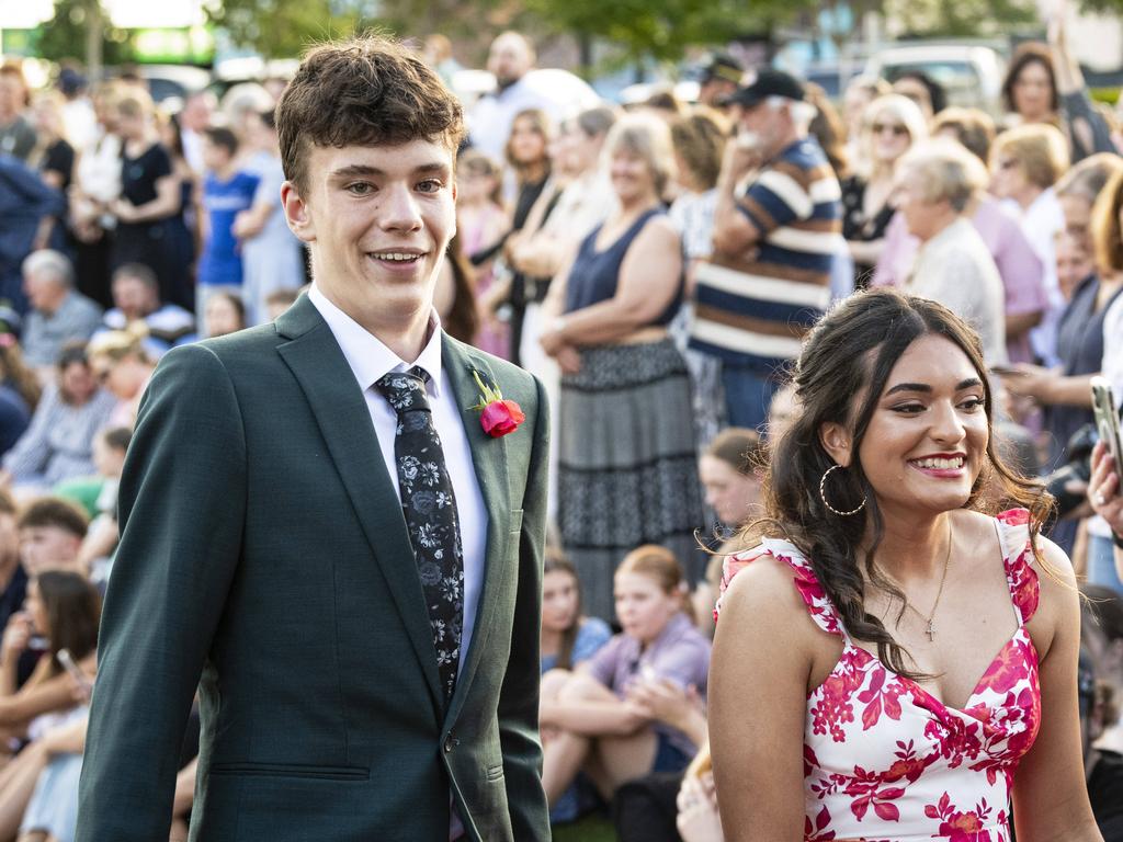 Graduate Noah Gunders and partner Ebony Naiker arrive at Mary MacKillop Catholic College formal at Highfields Cultural Centre, Thursday, November 14, 2024. Picture: Kevin Farmer