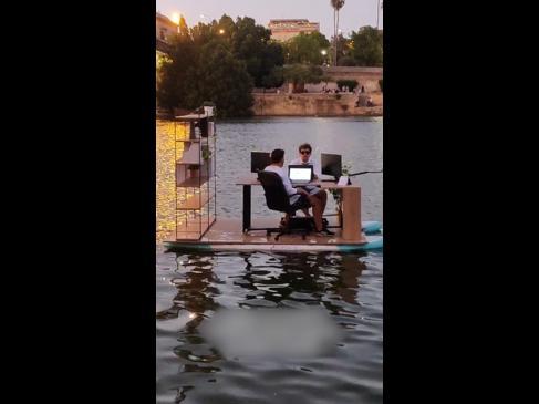 Desk on deck! Mates create floating office space