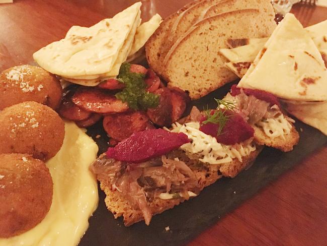 The tasting plate, including duck rillettes, arancini and spiced chorizo