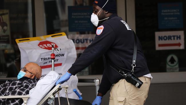 As the Australian death toll hit 52, New York suffered its darkest day, with 799 deaths in 24 hours. Picture: Spencer Platt/Getty Images/AFP