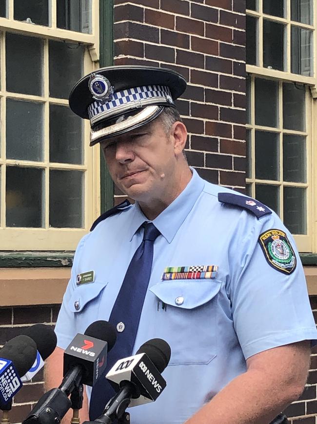 Superintendent Patrick Sharkey, commander of the Northern Beaches Police Area Command, briefing the media outside Manly police station. Picture: Jim O'Rourke