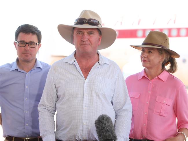 Barnaby Joyce with new Agriculture Minister David Littleproud and Deputy Nationals Leader Bridget McKenzie during a press conference at the Qantas Founders Museum in Longreach, Queensland. Picture Kym Smith