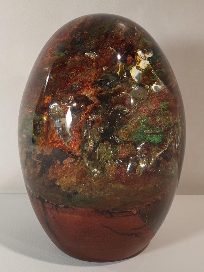 Sappho handcrafted wood and resin egg $380. <b>Shop now from <a href="https://www.sappho-designs.com/shop/iron-wood-enchanted-forest-resin-egg" target="_blank">Sappho Designs</a></b>