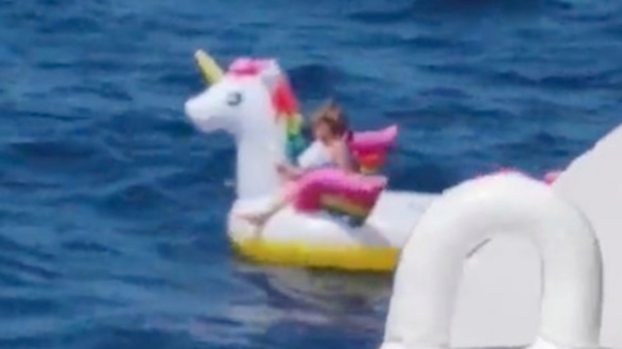 Girl rescued after she was swept to sea on giant inflatable unicorn