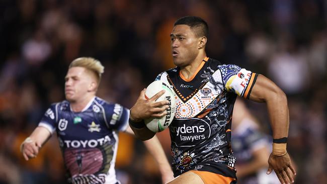 SYDNEY, AUSTRALIA - MAY 20:  Stefano Utoikamanu of the Tigers makes a break during the round 12 NRL match between Wests Tigers and North Queensland Cowboys at Leichhardt Oval on May 20, 2023 in Sydney, Australia. (Photo by Matt King/Getty Images)