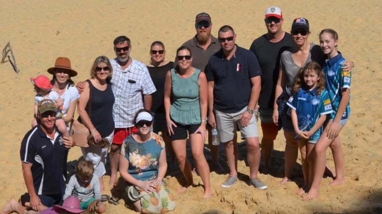 Jimmy Burgess pictured with his brothers, sisters, cousin and their families on one of their biannual family group trips to Rainbow Beach. Photo credit: Ellen-Rose Burgess