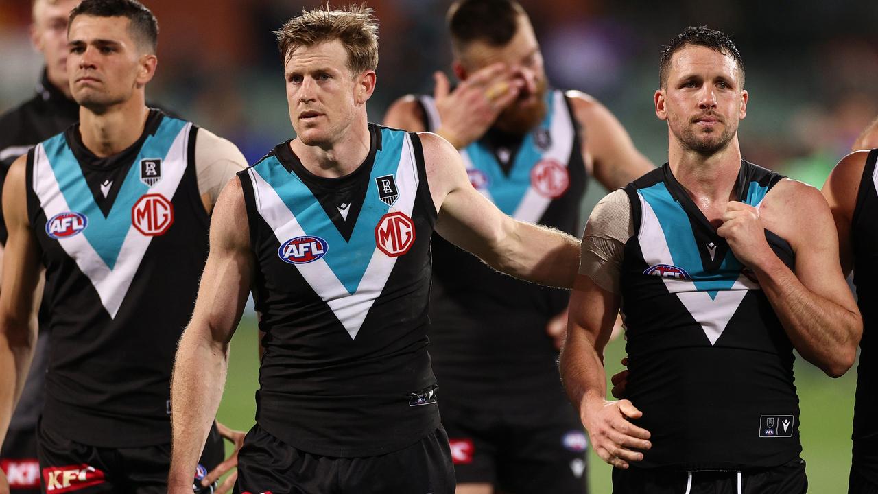 A dejected Tom Jonas with Travis Boak after the horror prelim. Picture: Getty Images