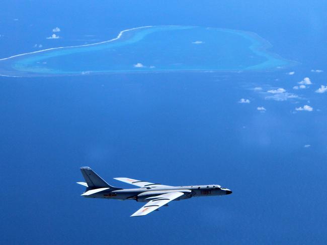 A Chinese H-6K bomber patrols the islands and reefs in the South China Sea, an area of tension between Washington and Beijing. Picture: Liu Rui/Xinhua via AP