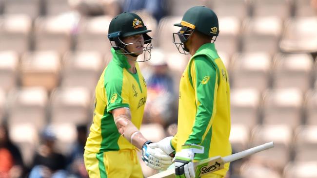 Will Usman Khawaja (R) join Steve Smith in Australia’s full-strength team? Picture: AFP