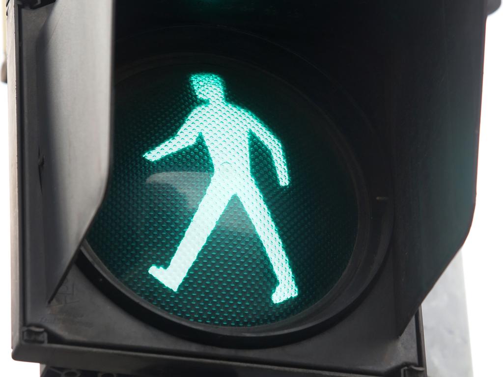 If there is no pedestrian crossing, pedestrians must give way to oncoming vehicles travelling straight ahead before they cross the road. Picture: Jono Searle/AAP