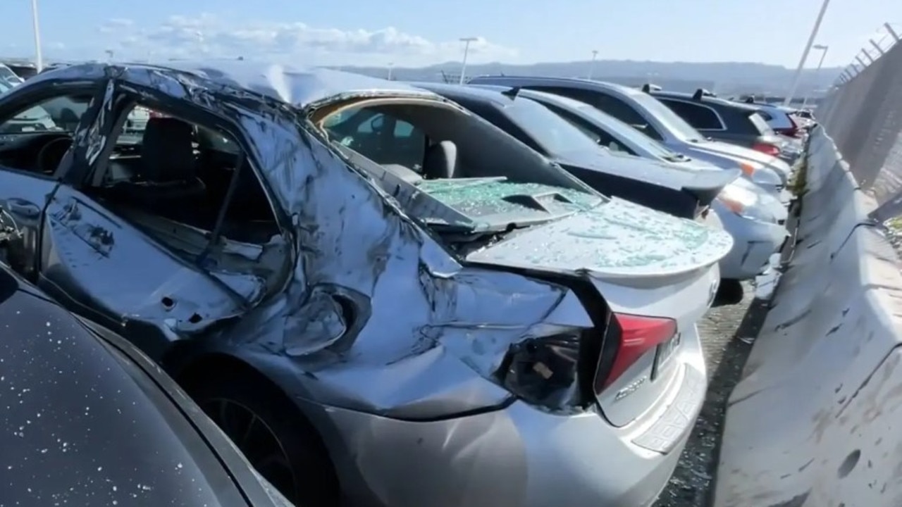 The fallen tyre damaged cars in the employee parking lot. Picture: CBS