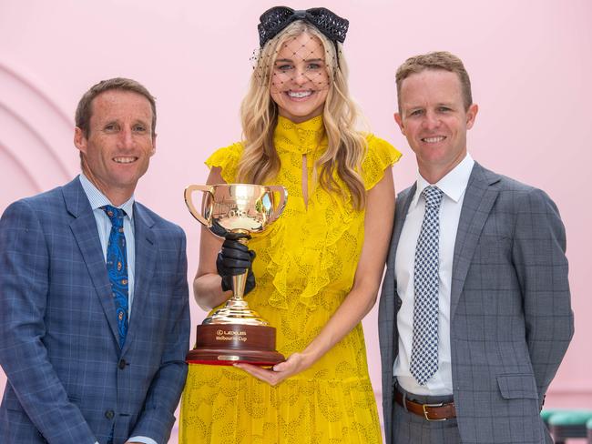 Melbourne Cup winning jockeys Damien Oliver (left) and Kerrin McEvoy (right) join ambassador Tegan Martin at the 2019 carnival launch at The Park, Flemington, on October 28. Picture: Jason Edwards