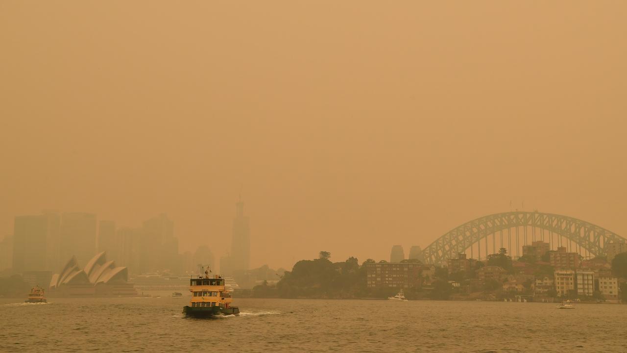 43. The Black Summer fires of 2019-2020 saw a blanket of smoke haze descend on Sydney Harbour, enveloping the Bridge and Opera House. Picture: Joel Carrett/AAP