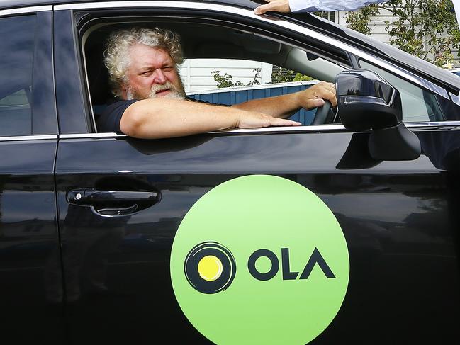 Managing director of Ola, Simon Smith, is in Hobart to launch his new ride sharing app.  He is pictured with new driver, Scott Greene of Hobart.Picture: MATT THOMPSON