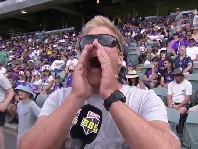 "Siren Man" demonstrates the wail during an interview at a Hobart Hurricanes game against the Brisbane Heat.