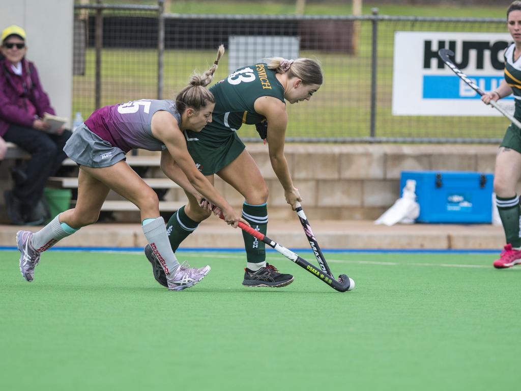 Caleisha Haper (right) on the move for Ipswich against Gladstone in Hockey Queensland Championships at Clyde Park, Sunday, May 2, 2021. Picture: Kevin Farmer