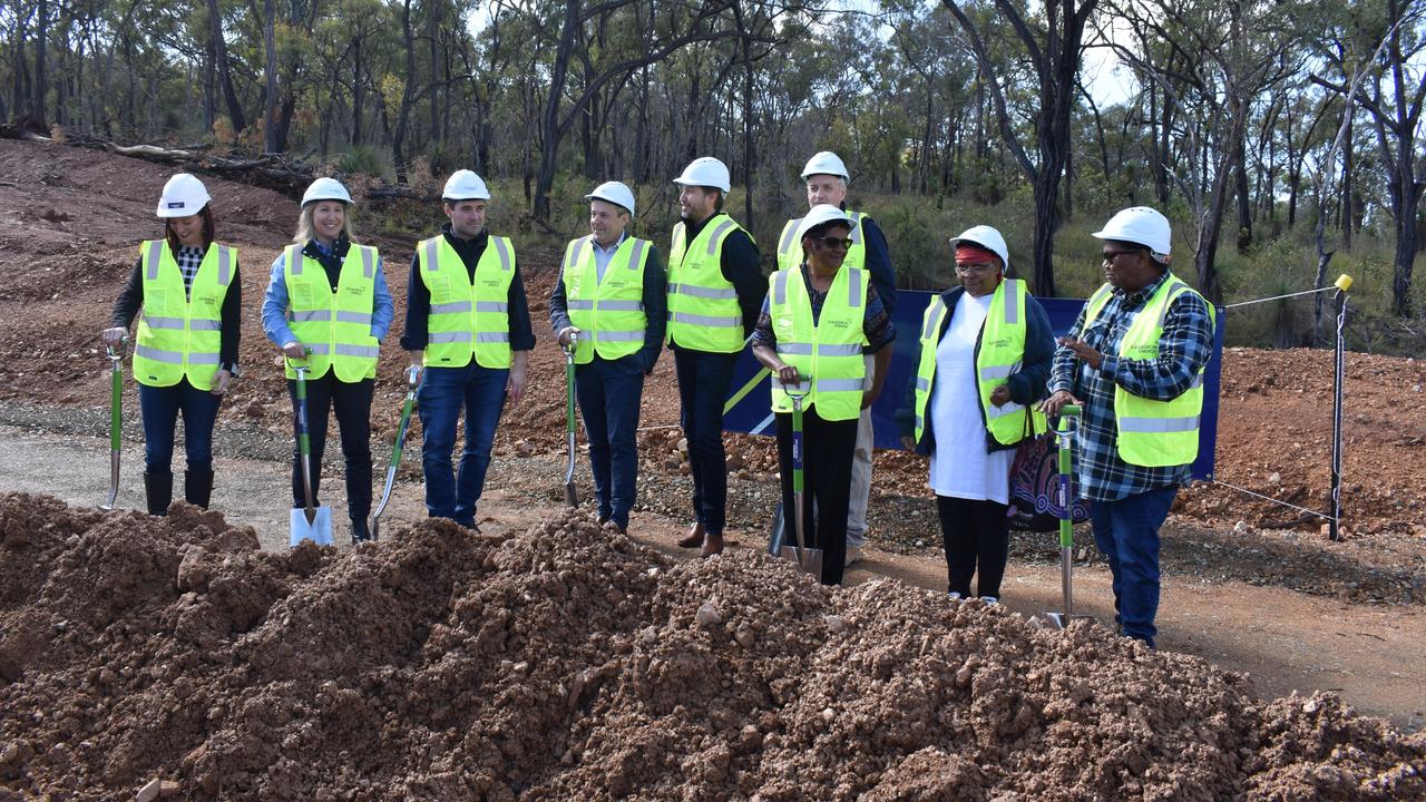 Dignitaries conducting the sod turning at the groundbreaking ceremony of the $3 billion Clarke Creek Wind Farm on July 6.