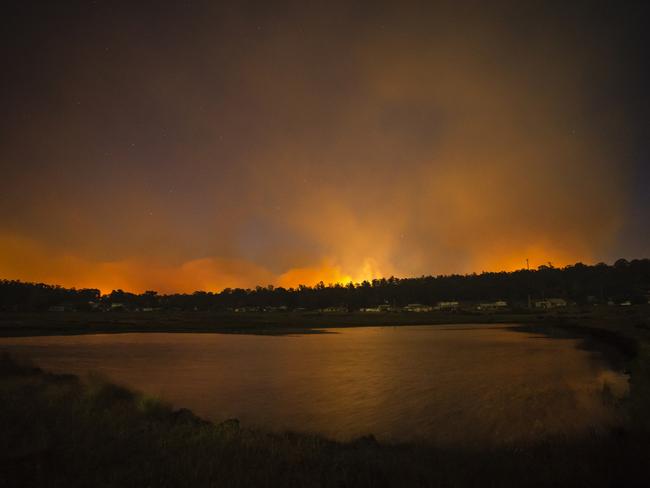 Smoke and fire behind the Great Lake near Miena. Picture: Heath Holden/Getty