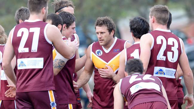 Campbell Brown is mobbed by his Lower Plenty teammates after booting a goal. Picture: Josie Hayden