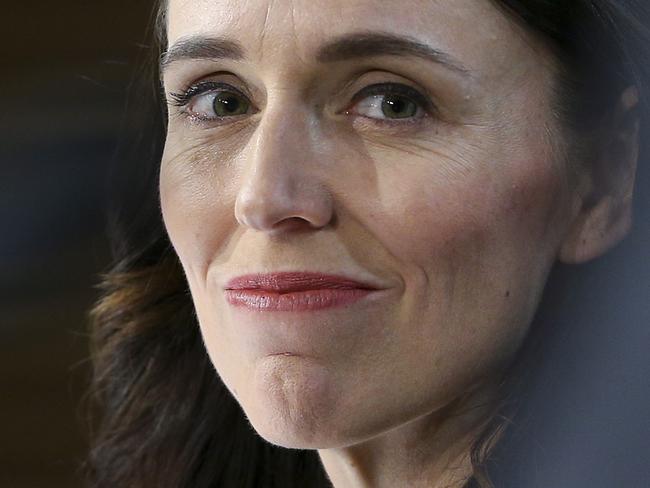 WELLINGTON, NEW ZEALAND - APRIL 14: Prime Minister Jacinda Ardern looks on during a press conference at Parliament on April 14, 2020 in Wellington, New Zealand. New Zealand has been in lockdown since Thursday 26 March following tough restrictions imposed by the government to stop the spread of COVID-19 across the country.  A State of National Emergency is in place along with an Epidemic Notice to help ensure the continuity of essential Government business. Under the COVID-19 Alert Level Four measures, all non-essential businesses are closed, including bars, restaurants, cinemas and playgrounds. Schools are closed and all indoor and outdoor events are banned. Essential services will remain open, including supermarkets and pharmacies. Lockdown measures are expected to remain in place for around four weeks, with Prime Minister Jacinda Ardern warning there will be zero tolerance for people ignoring the restrictions, with police able to enforce them if required.  (Photo by Hagen Hopkins/Getty Images)