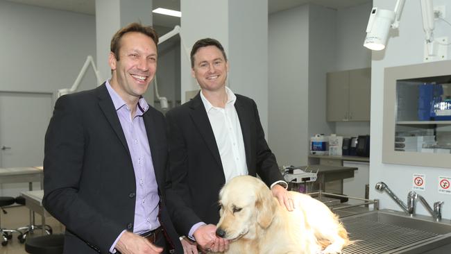 Chief executive Tomas Steenackers and CFO Jason Beddow with Cleo the dog. Picture: Mike Batterham